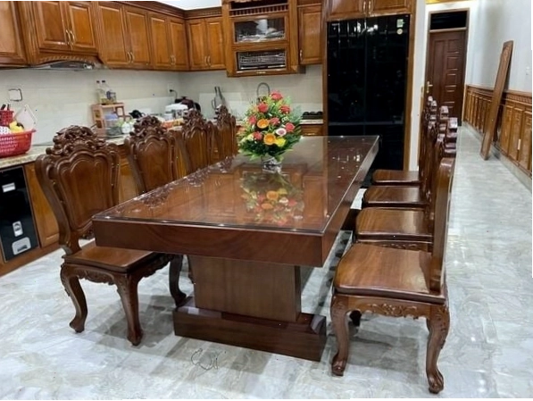 Bàn ăn gỗ óc chó nguyên khối kiểu dáng hiện đại