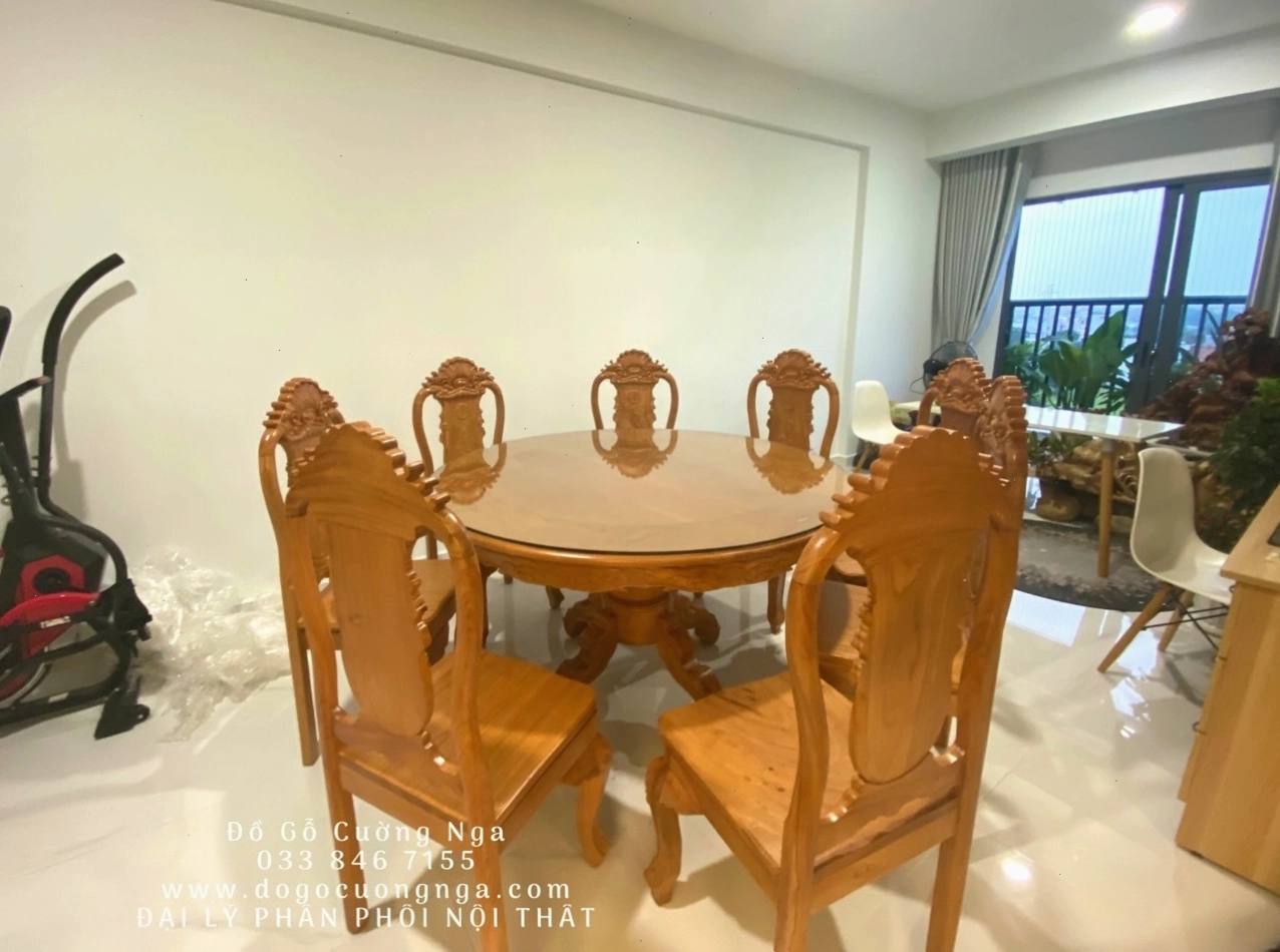 Bàn ăn tròn gỗ gõ đỏ sang trọng