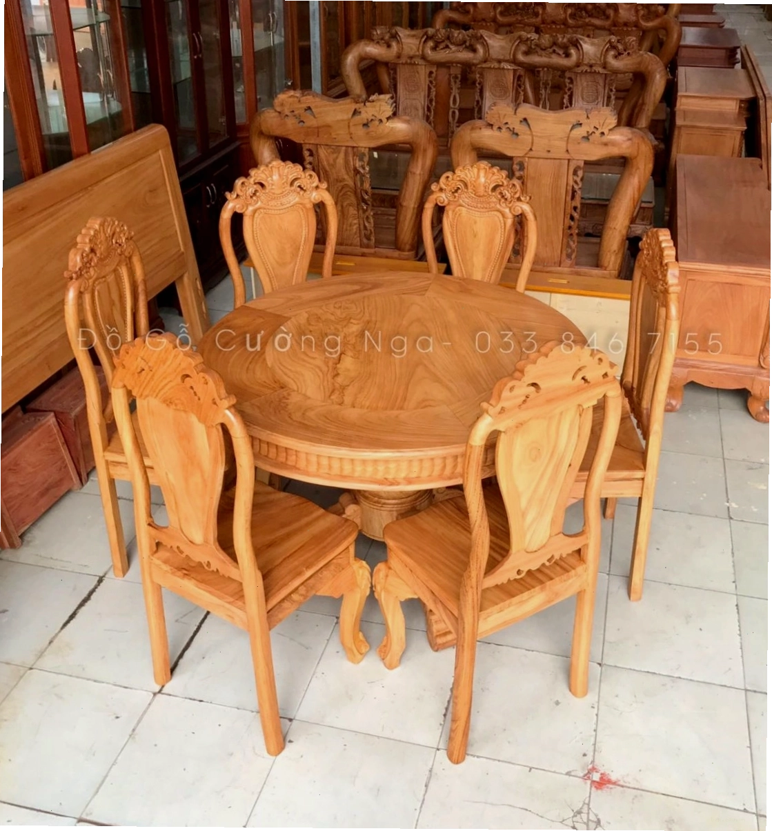 Bộ bàn ăn tròn 8 ghế gỗ gõ đỏ sang trọng
