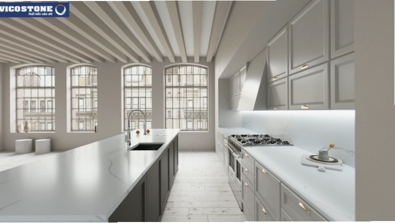 Đảo bếp với mặt đá Vicostone Alessandria nổi bật trên nền tủ bếp đen