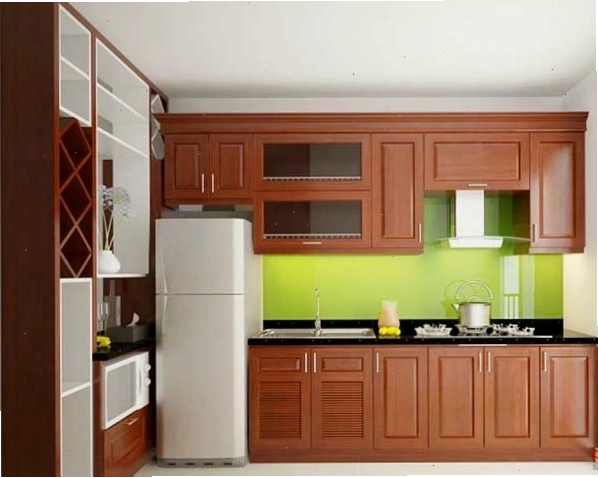 Khu vực bếp với tủ bếp gỗ xoan đào được bố trí khoa học