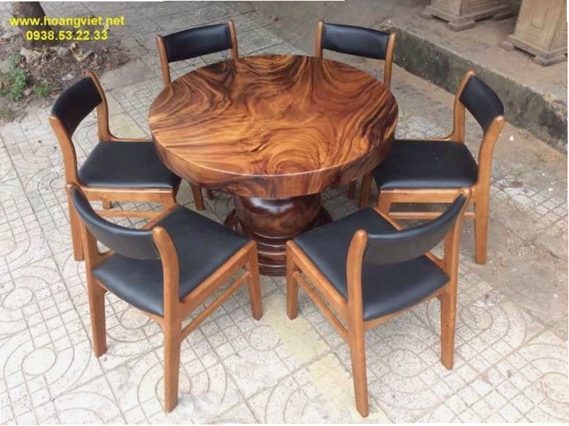 Mẫu bàn ăn tròn gỗ tự nhiên nguyên khôi đẹp tại tphcm