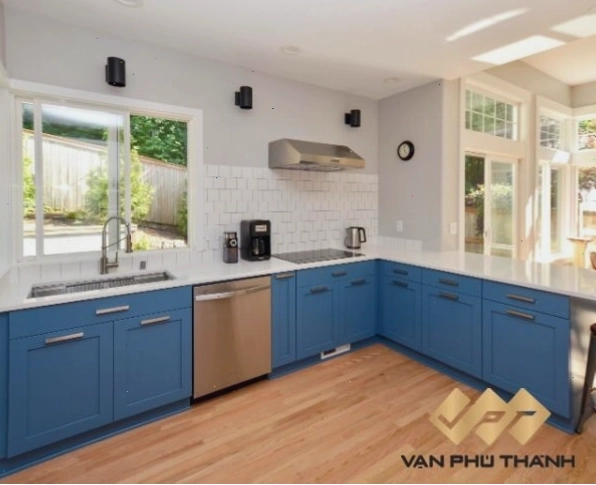Mẫu tủ bếp dưới đẹp màu xanh thi công bằng vật liệu gỗ nhựa An Cường cao cấp