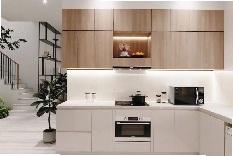Tủ bếp góc chéo làm từ gỗ công nghiệp màu xám sang trọng