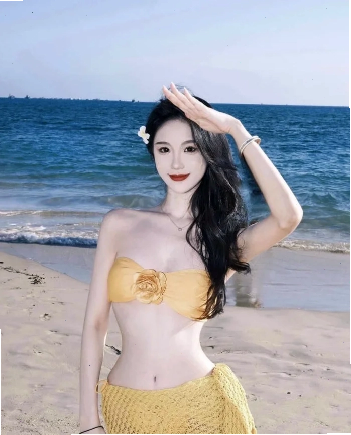 Gái xinh Trung Quốc diện bikini màu đỏ nổi bật trên bãi biển